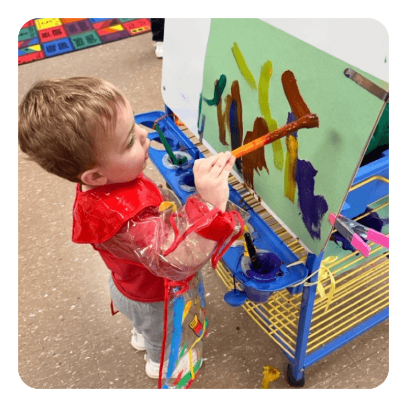 child coloring at daycare